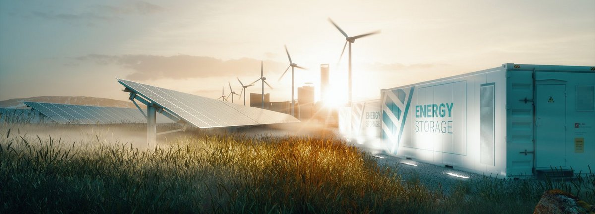 Smart Grid Konzept mit Windrädern, einer Solarzelle auf einem Feld und einem Batteriespeicher